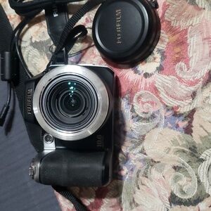 *FUJIFILM FinePix S8100fd Digital Bridge Camera.